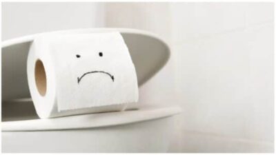 Toilet paper on the toilet bowl at home. stock phot