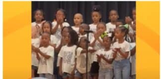 Little girl steals the show at kindergarten graduation performance