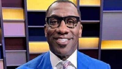 Shannon Sharpe (blue jacket)