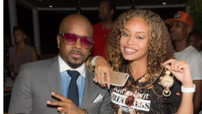 Jermaine Dupri and Latto pose for photos