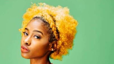 Young lady with bleached curly hair
