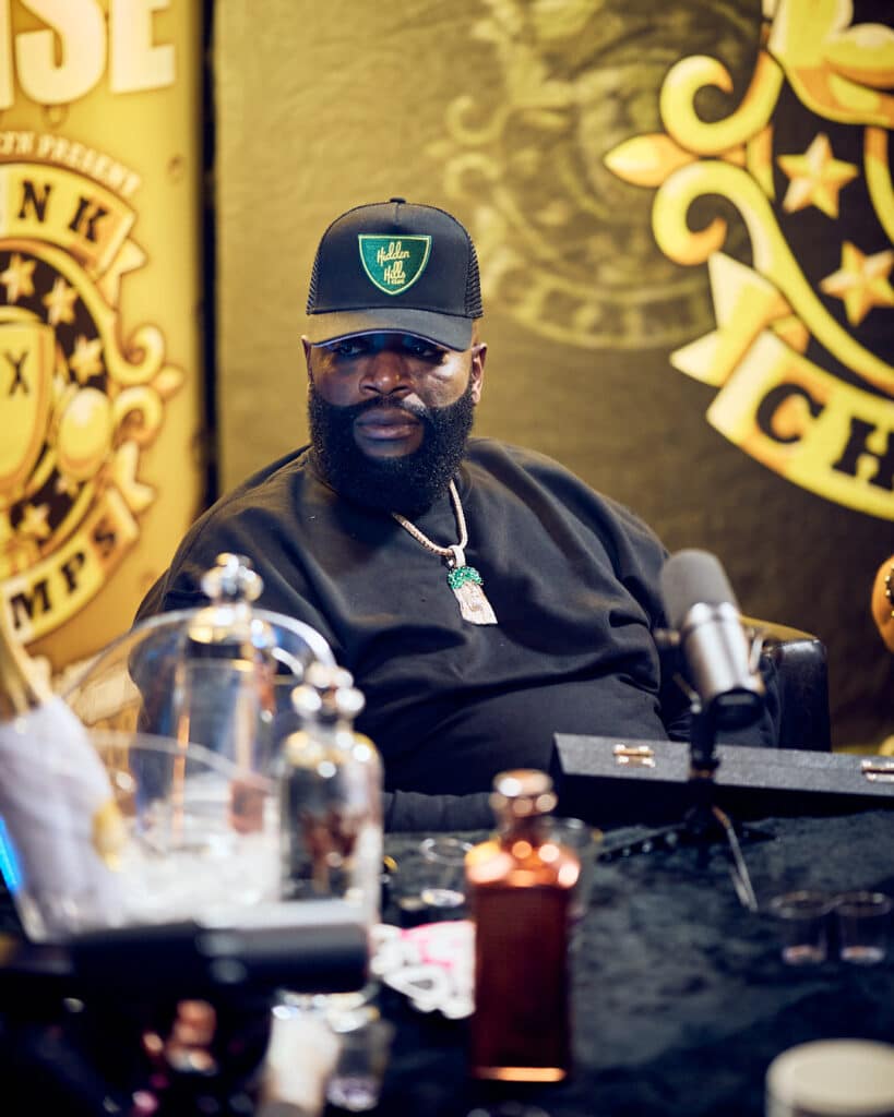Rick Ross chops it up with "Drink Champs." Photo Credit: Revolt TV