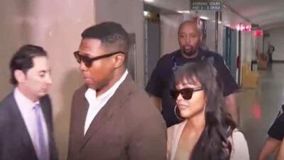 Jonathan Majors & Meagan Good enter courtroom - APtv screenshot