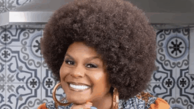 Tabatha Brown with hand under chin for McCormick Sunshine Seasonings