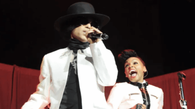 Prince performs with Janelle Monae at Mohegan Sun Arena on December 29, 2013 in Uncasville, Connecticut. (Photo by Kevin Mazur/WireImage for NPG Records 2013)