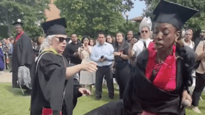 Kadia Iman in scuffle with white educator during graduation ceremony