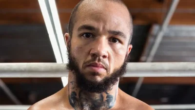 Patricio &ldquo;Pat&rdquo; Manuel poses in front of the ring