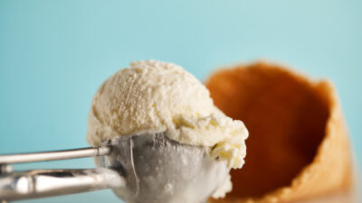 Scoop of Ice Cream and cone - Depositphotos