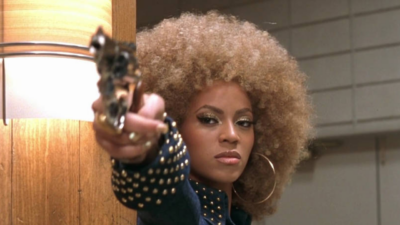 Beyonce points a gun as Foxxy Cleopatra in "Austin Powers in Goldmember" -