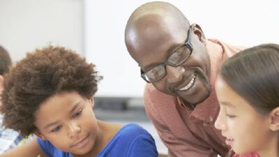 Black male school teacher- Depositphotos