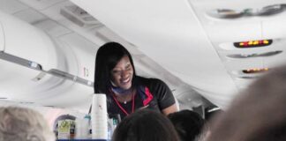 African American (female) Flight Attendant - Getty