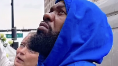 Raekwon speaks with the interior designer for his cannabis dispensary Hashstoria in Newark, NJ