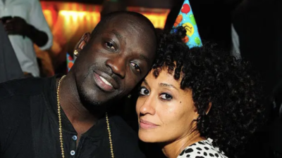 Bu Thiam and Tracee Ellis Ross pose during the Watch The Throne concert after party at Reign Nightclub on October 28, 2011 in Atlanta, Georgia.