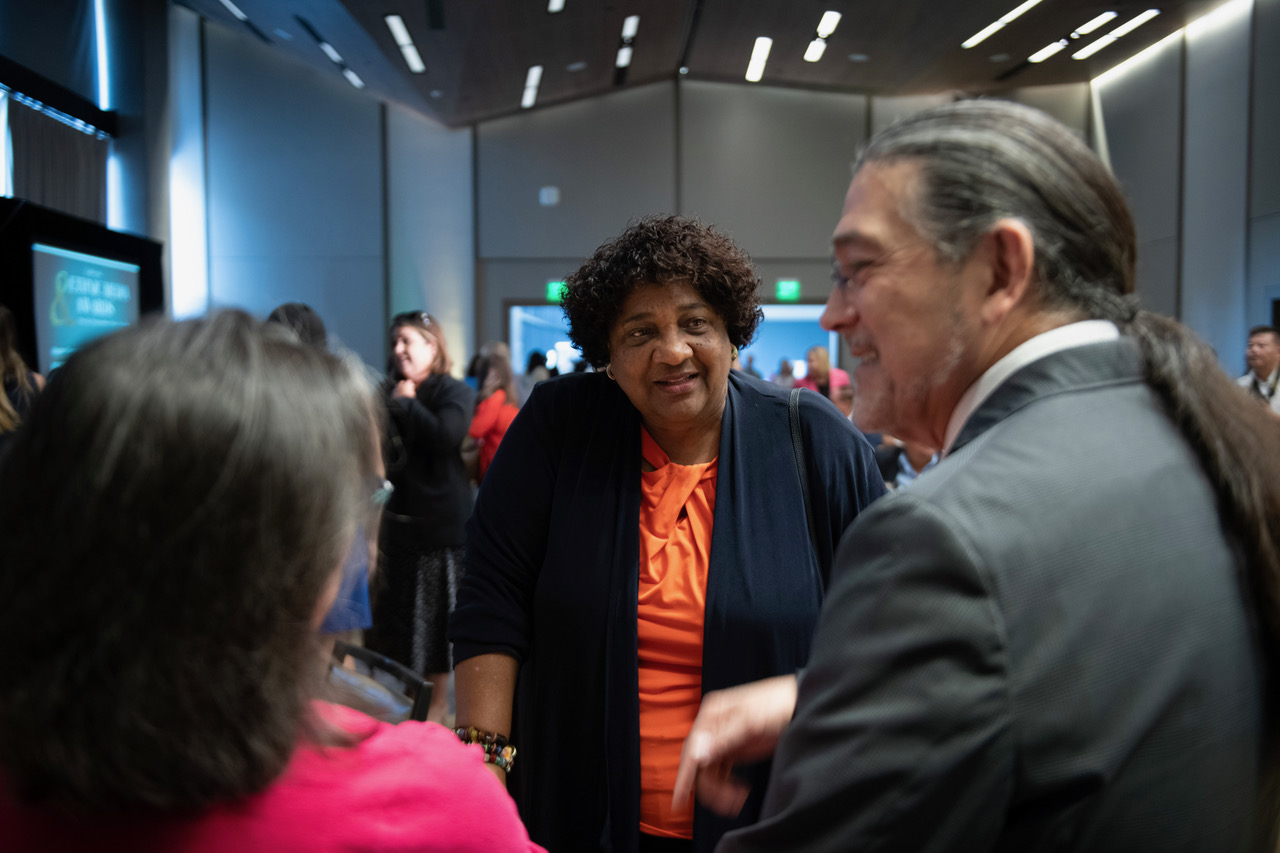 Secretary of State Shirley N. Weber speaks with Rob Santos, Director for the US Census Bureau, at the 2023 Ethnic Media Awards Luncheon. (photo by Robert Maryland/CBM)