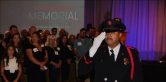 Thomas Jay, Fire Battalion Chief for Riverside (Retired) leads the indoor procession at the California Firefighters Memorial Ceremony at the Sheraton Grand Hotel in Sacramento. The event honored 35 firefighters who died in the line of duty. Oct. 14, 2023. CBM Photo by Antonio Ray Harvey.