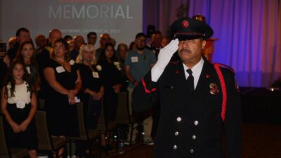 Thomas Jay, Fire Battalion Chief for Riverside (Retired) leads the indoor procession at the California Firefighters Memorial Ceremony at the Sheraton Grand Hotel in Sacramento. The event honored 35 firefighters who died in the line of duty. Oct. 14, 2023. CBM Photo by Antonio Ray Harvey.