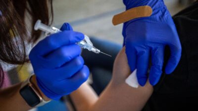Getting Vaccinated (Francine Orr-Los Angeles Times-Getty Images)