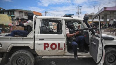Police officers patrol a Haiti neighborhood amid gang-related violence in downtown Port-au-Prince on April 25, 2023. / (Richard Pierrin-AFP-Getty Images)