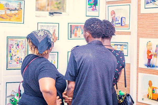 Cartoon enthusiasts view cartoons at CACAFEST