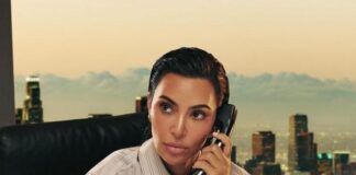 Kim Kardashian (as a man on phone) - via Instagram