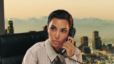 Kim Kardashian (as a man on phone) - via Instagram