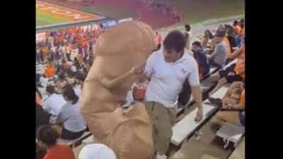 Sam Houston State University Bearkats fan led out of stadium for wearing highly inappropriate costume - screenshot