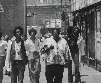 WAR (L to R: B. B. Dickerson, Harold Brown, Lee Oskar, Papa Dee Allen, Lonnie Jordan, Howard Scott, Charles Miller)