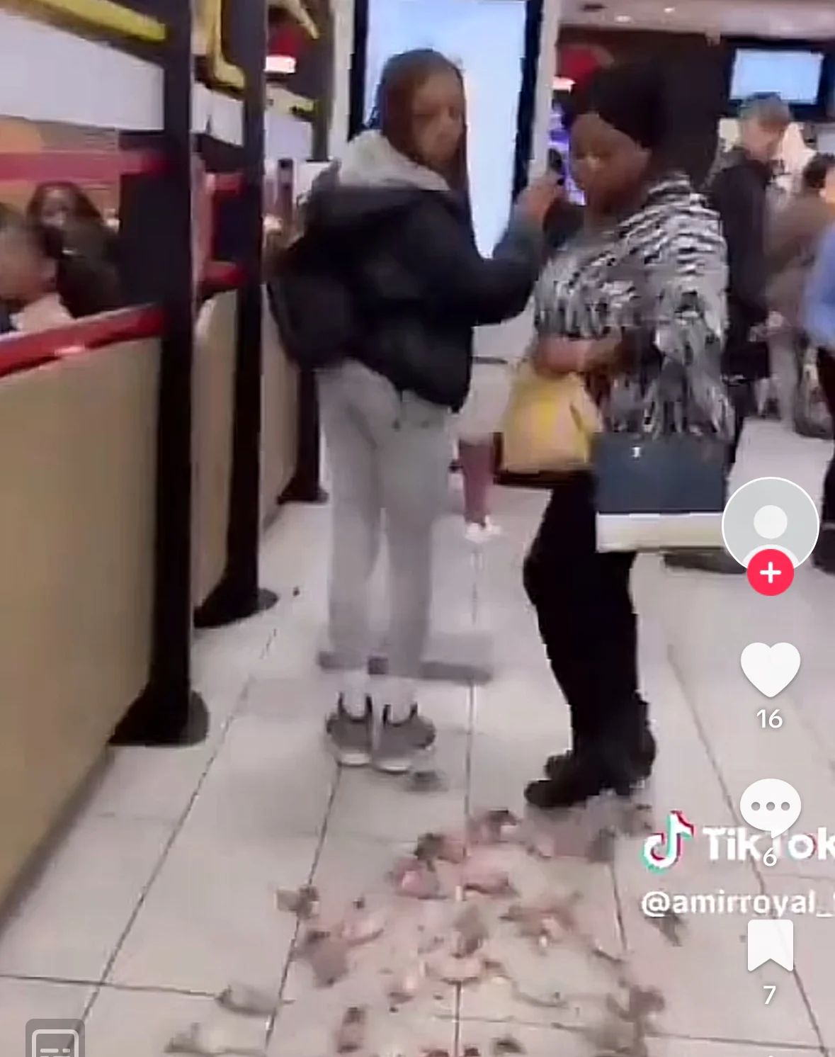 Protester throws box of painted mice into McDonald's