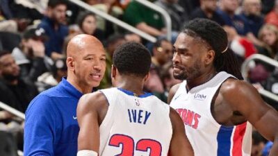 Detroit Pistons coach and players (Chris Schwegler-NBAE-Getty Images)