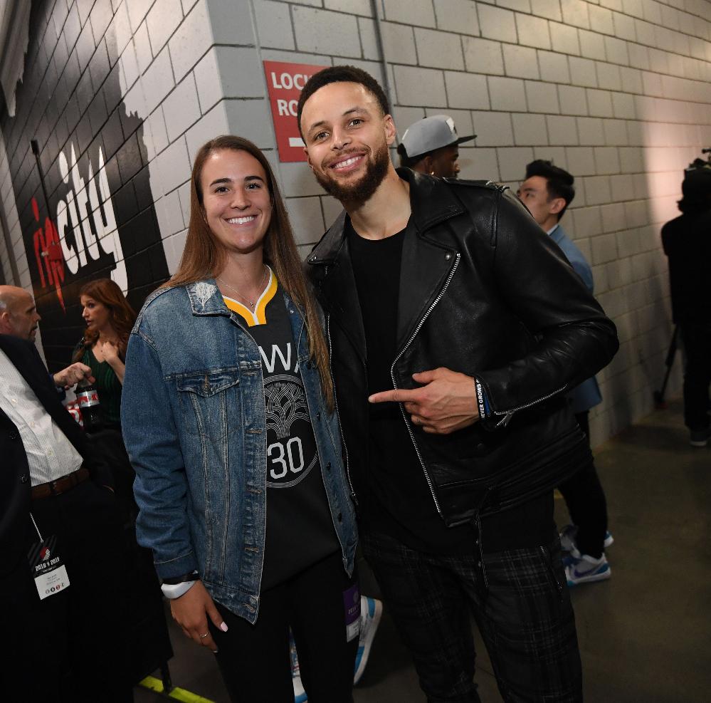 Sabrina Ionescu and Steph Curry (Noah Graham-NBAE-Getty Images) 