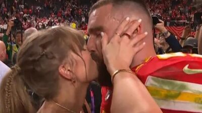 Taylor Swift kisses Travis Kelce after Super Bowl win (photo via NFL)