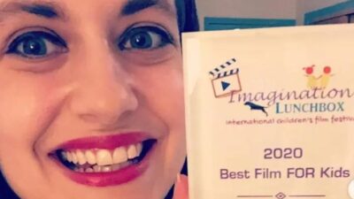 Young filmmaker Nicola Rosa showing her award at Imagination Lunchbox International Film Festival