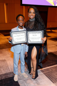 LOS ANGELES, CALIFORNIA - FEBRUARY 25: (L-R) Aaron Kingsley Adetola and Kyla Pratt attend the NAACP Image Awards Nominees Brunch at Fairmont Century Plaza on February 25, 2024 in Los Angeles, California. (Photo by Leon Bennett/Getty Images for NAACP)
