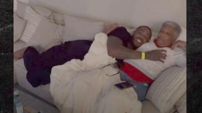 Aroldis Chapman with hand on (mother's) breast - screenshot
