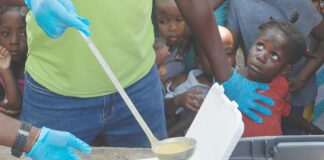Hunger in Port-au-Prince Haitu (Odelyn Joseph-AP via CNN Newsource)