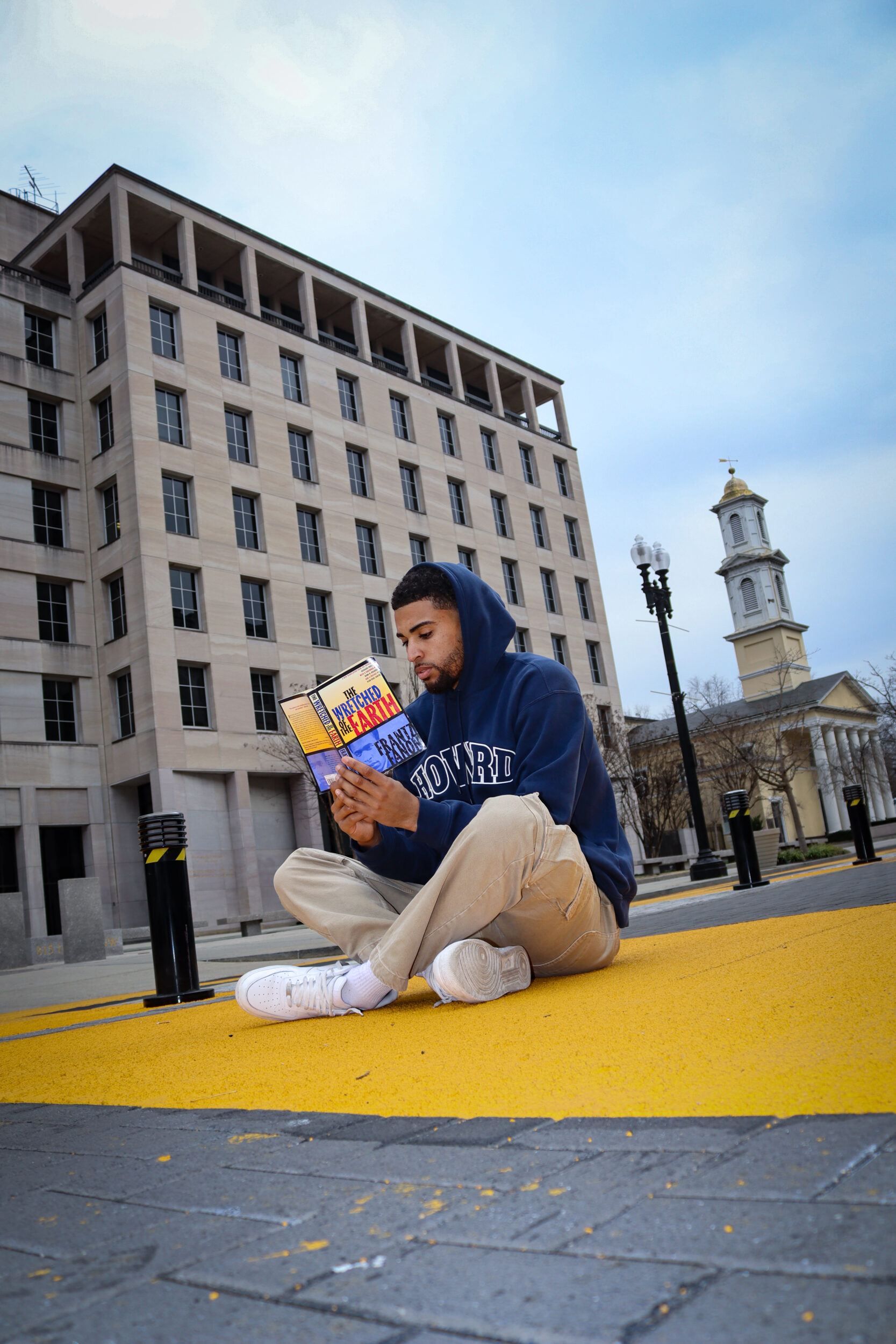 A sense of Deja Vu strikes, Seth Towns, 26, as he visits The Black Lives Matter Plaza, in Washington D.C. and is reminded of the day he went to jail protesting the cause he was fighting for..Photo by Harmony Bailey