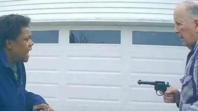 Loletha Hall confronted by William Brock (with gun) - Screenshot via Ckark Co Sheriffs Dept