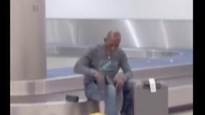 Man Goes Shopping At MIA Baggage Claim