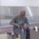 Man Goes Shopping At MIA Baggage Claim