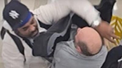 Jim Jones airport escalator fight - v ia TMZ screenshot