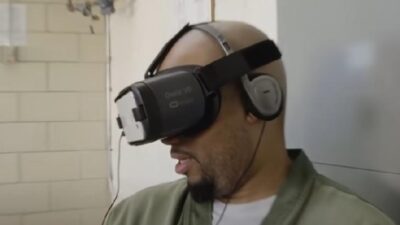 Prisoner wearing VR headset - screenshot