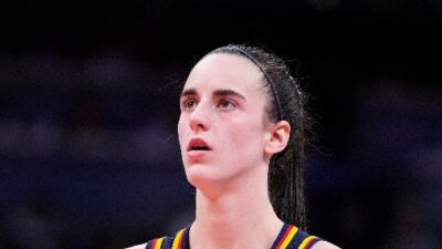 Caitlin Clark setting to shoot free-throw (Michael Conroy-AP via CNN Newsource)