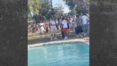 Compton pool party - via TMZ screenshot