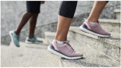 athletes running on stairs stock photo