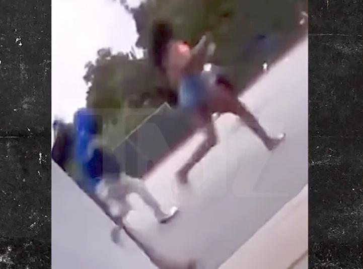 People running as Compton Pool Party Turns Tragic- via TMZ screenshot