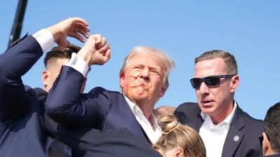Donald Trump being rushed from stage in Butler PA