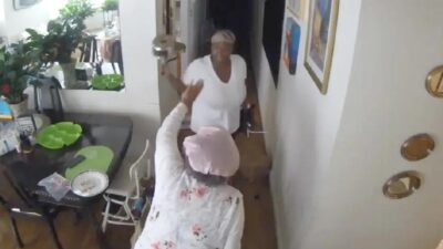 Dorothy Foye being struck by health care worker with an aluminum pot - screenshot