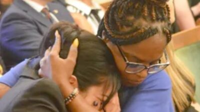 Odessa Perkins comforts a survivor of human trafficking - via CBM