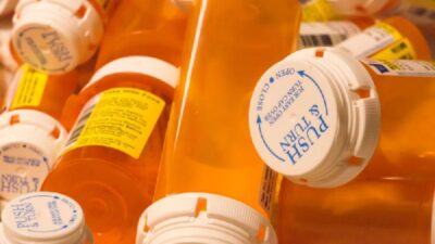 (Opiod) pill bottles - Depositphotos