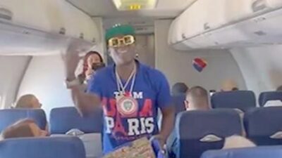 Flavor Flav handing snacks on Southwest Airlines - screenshot